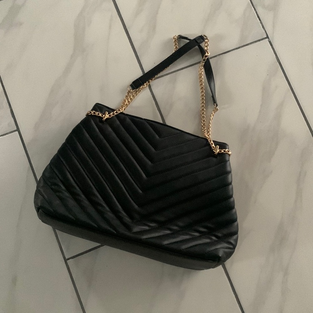 Black purse. “A new day” purse